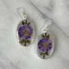 Alpaca Silver Oval with Purple Pressed Flower Dangle Earrings